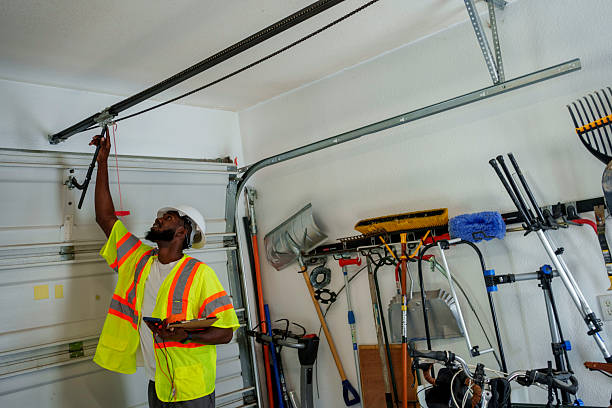 Professional Garage Door Panel Replacement technician working in Cortland, NY